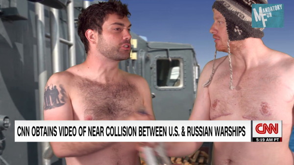 Shirtless Russian sailors casually sunbathe while their ship almost collides with US missile cruiser