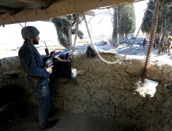 Taliban fighters attack Afghan forces on the first day of reduced violence period