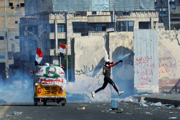 Iraqis take to the streets for the biggest day of protests since Saddam Hussein’s rule