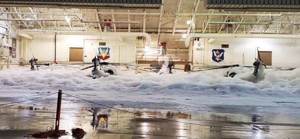 Yes, this is a helicopter hangar filled with foam, and no, this definitely wasn’t supposed to happen