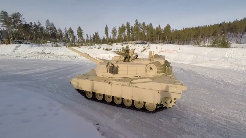 Marine Corps tanks slip on the ice in Norway