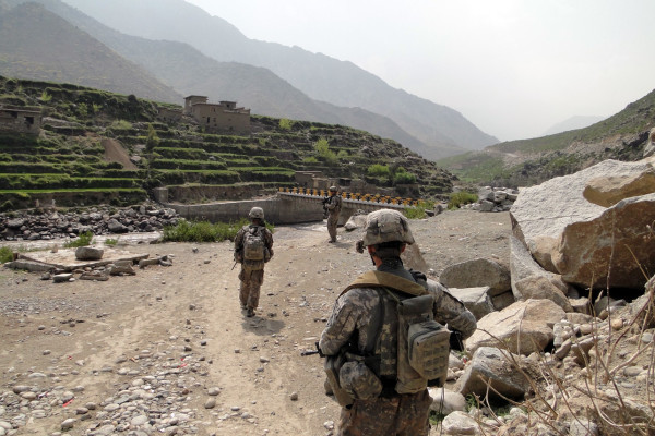 Members of Red Platoon, 61st Cavalry Regiment, patrol the village of Saw, Afghanistan, 2009.US Army