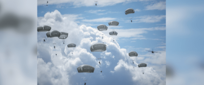 Watch over 300 Army paratroopers drop into Guam just to remind folks who’s boss