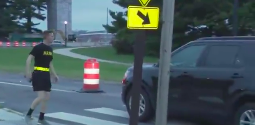 Two soldiers were almost hit by a car during a live TV report on traffic safety in D.C.