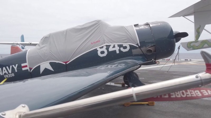 WWII-era warbirds arrive in Hawaii on the USS Essex