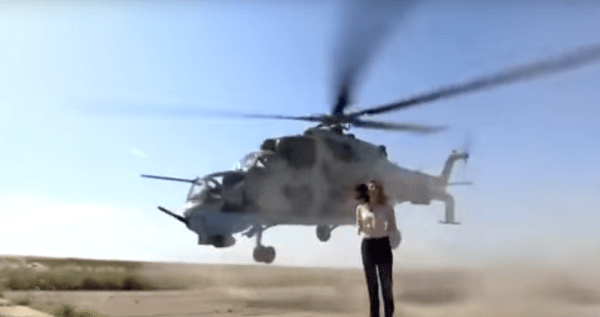 TV Broadcaster Completely Unfazed As Attack Helicopter Nearly Takes Her Head Off