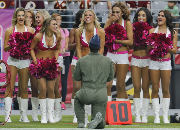 An Air Force Fighter Pilot Proposed To His NFL Cheerleader Girlfriend On The Sideline Of A Game