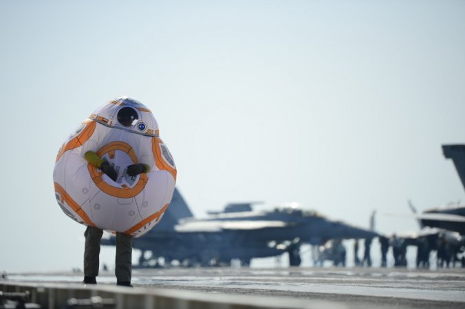 We salute the sailor who walked the flight deck in a Star Wars droid costume