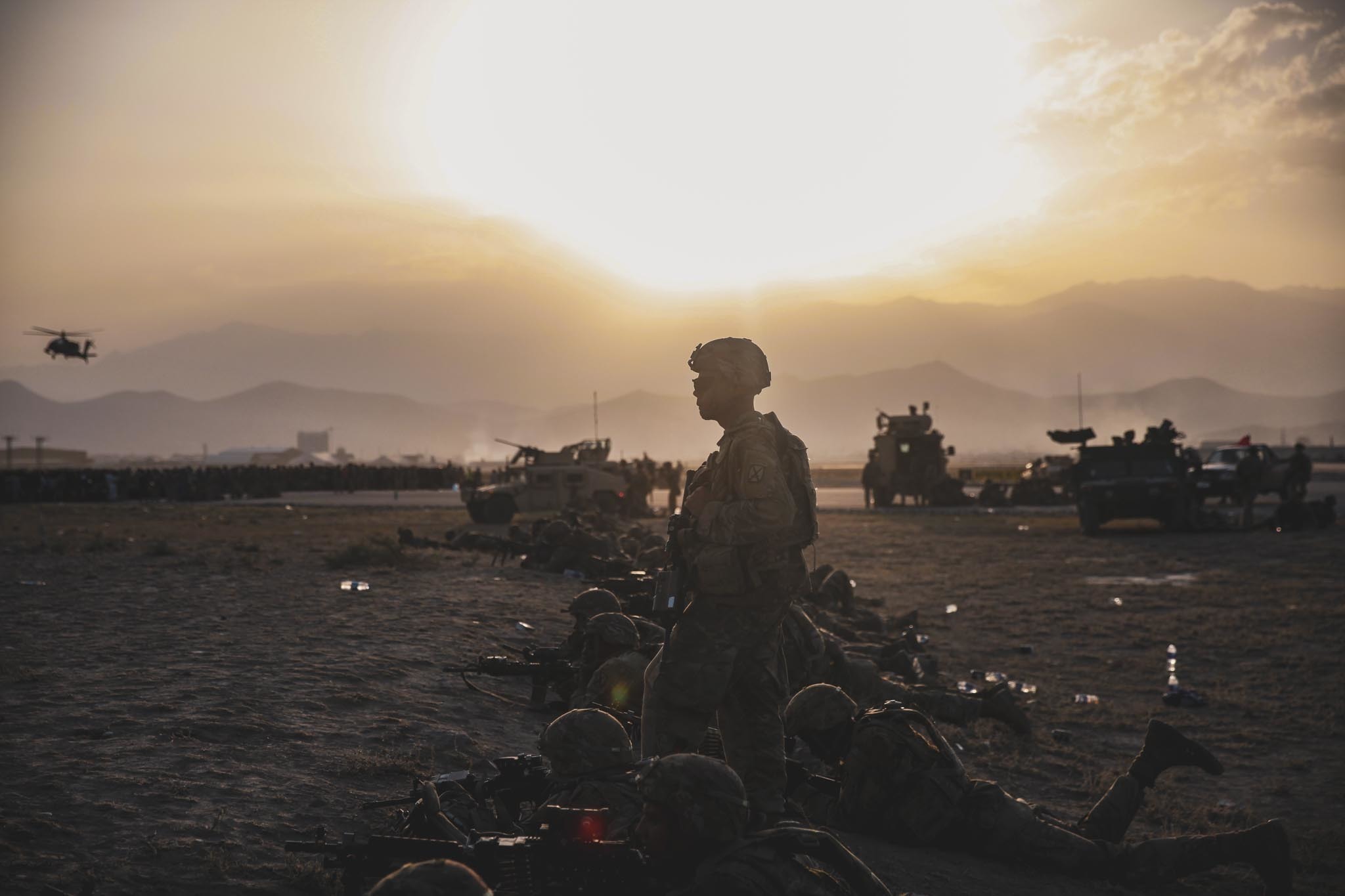 U.S. Army Soldiers assigned to the 10th Mountain Division stand security at Hamid Karzai International Airport, Kabul, Afghanistan, August 15. U.S. Soldiers and Marines are assisting the Department of State with an orderly drawdown of designated personnel in Afghanistan.