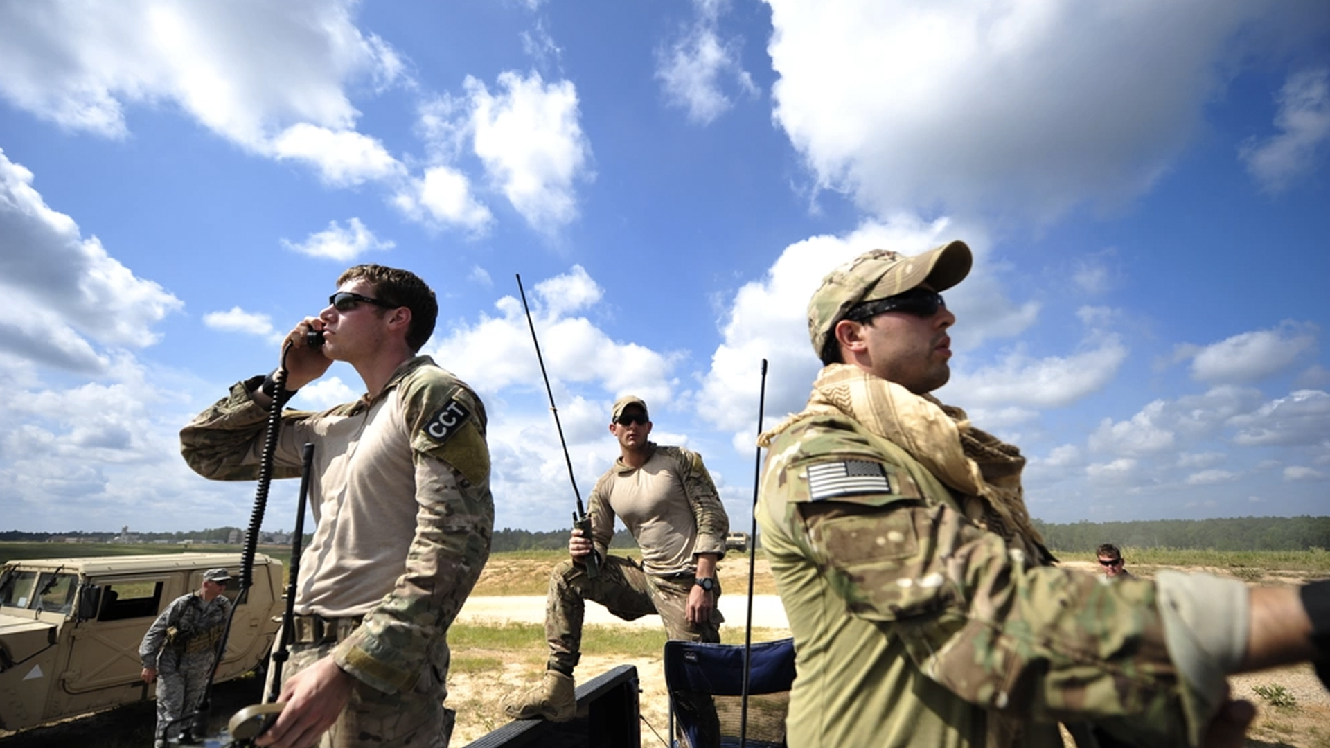 U.S. Air Force combat controllers from the 21st Special Tactics Squadron, Fort Bragg, N.C., conduct air traffic control operations on the edge of the Geronimo Landing Zone at Fort Polk, La. during Joint Readiness Training Center rotation 13-09, Aug. 20, 2013.