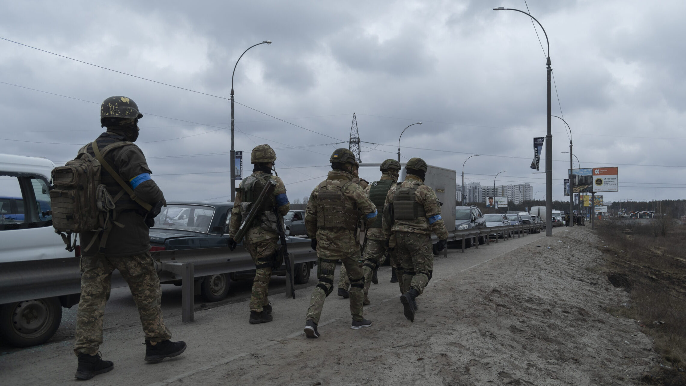Ukrainian Soldiers Walks Toward The Frontline Near Irpin