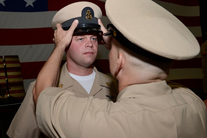 This soldier is taking others SCUBA diving for their reenlistment