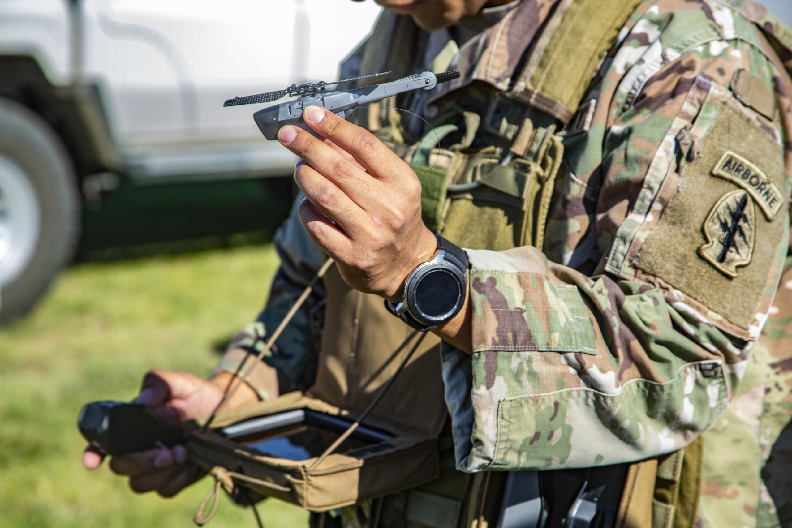 Green Beret launching a small drone.