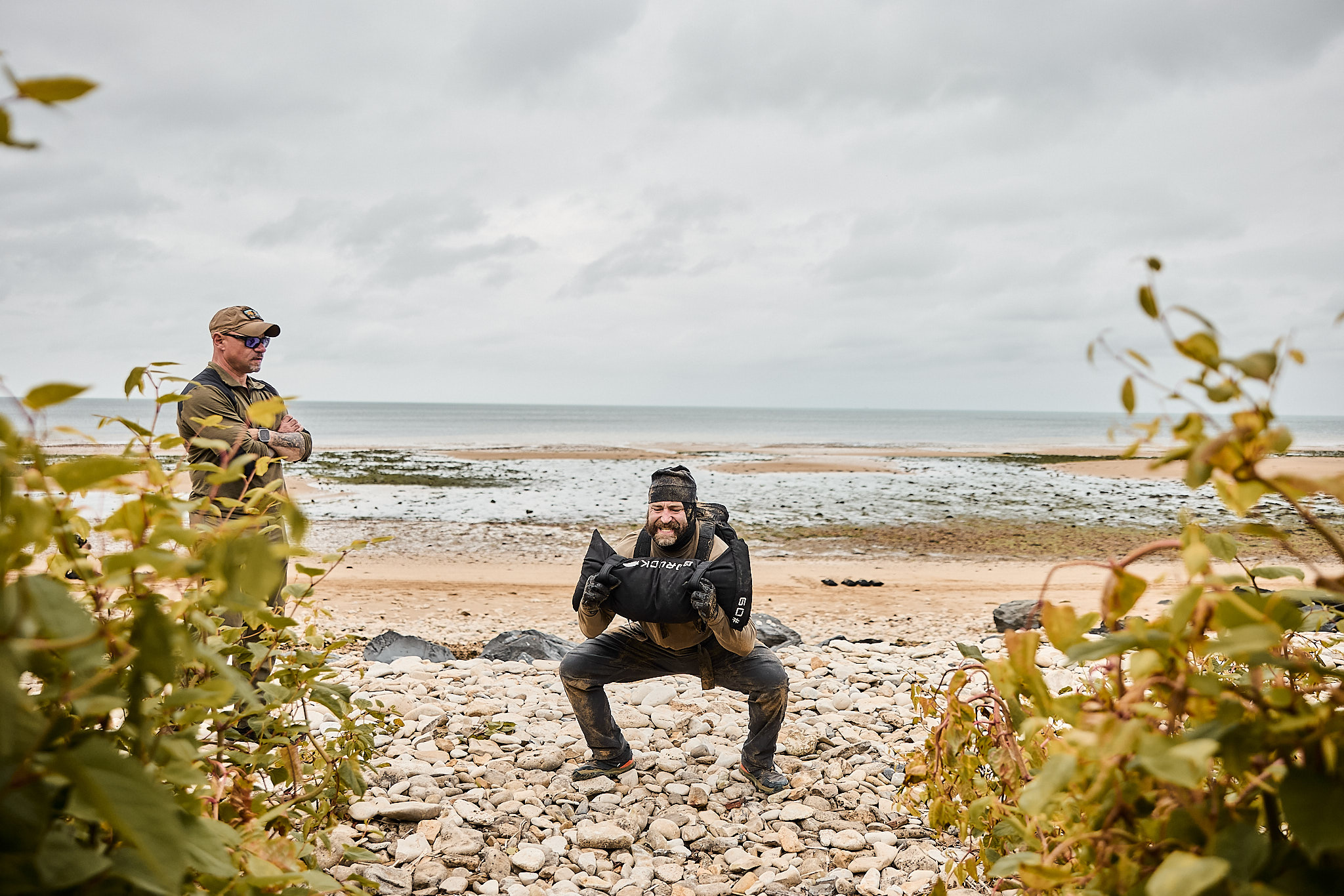 Adam Howthe doing sandbag movements in the final 24 hours of the Selection in Normandy, France.