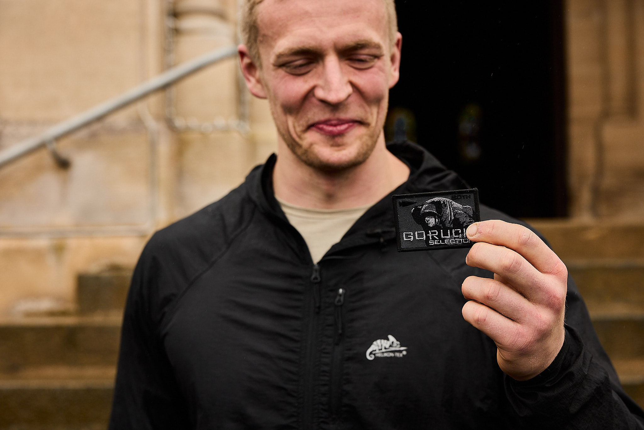 Marc Buddensiek holding the coveted GoRuck Selection patch.
