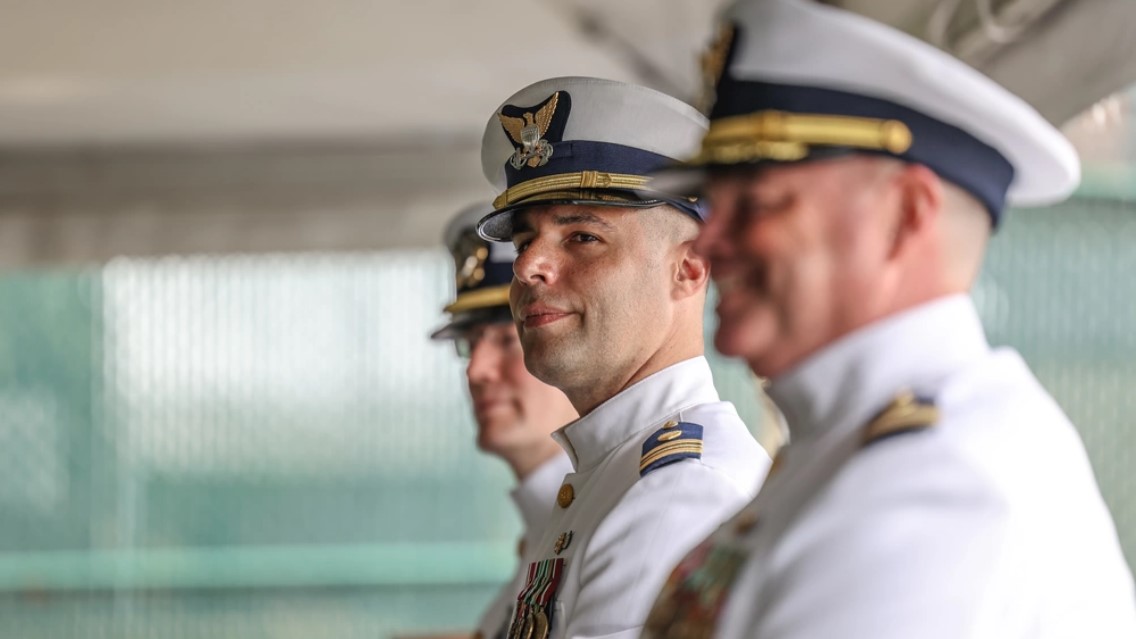 Cmdr. David Ruhlig (center) assuming command of Coast Guard Station New York in July 2021. (photo by Daniel Henry/U.S. Coast Guard)