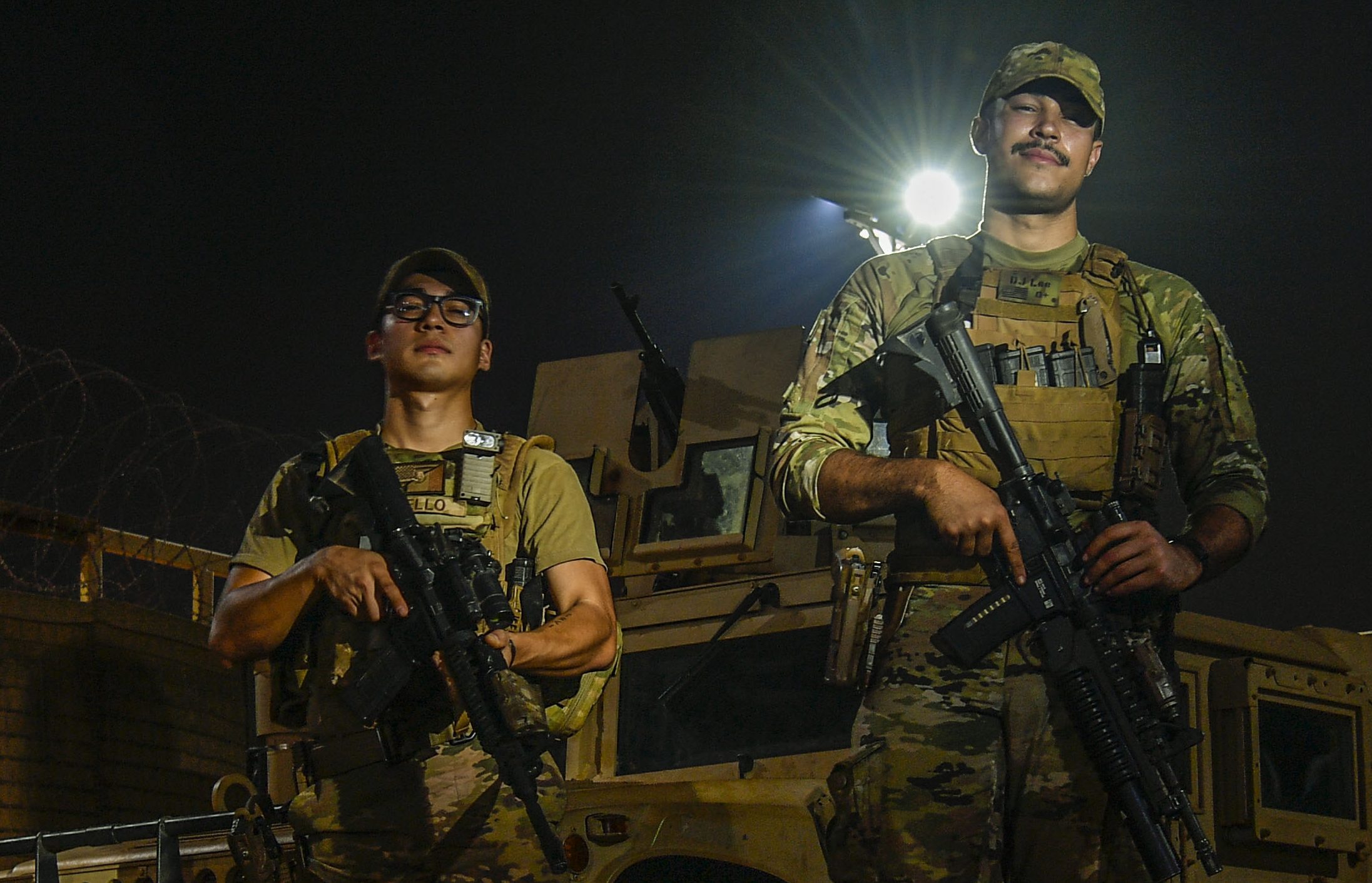 U.S. Air Force Airman 1st Class Luis Fernando Tello and Airman 1st Class Kameron Lee, 768 Expeditionary Air Base Squadron Security Forces Flight Response Force Airmen, at Air Base 101, Niamey, Niger, March 1, 2022. The 768th Expeditionary Air Base Squadron, plays a key role in counter-violent extremism operations in the Sahel by providing infrastructure, sustainment, operational mission generation, and base defense. Security Forces Airmen provide defense-in-depth while strengthening relationships with Nigerien security forces, primarily the Forces Armées Nigériennes (FAN), in support of more stable, prosperous Africa. (U.S. Air Force photo by Staff Sgt. Nicholas Byers)
