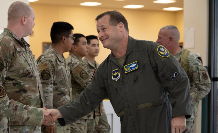 U.S. Air Force Maj. Gen. Phillip Stewart, 19th Air Force commander, greets Airmen at the 54th Operations Support Squadron at Holloman Air Force Base, New Mexico, Sep. 28, 2022. Aircrew flight equipment Airmen supported Stewart by preparing and fitting his flight gear for an F-16 Viper familiarization flight (U.S. Air Force photo by Airman 1st Class Corinna Diaz)