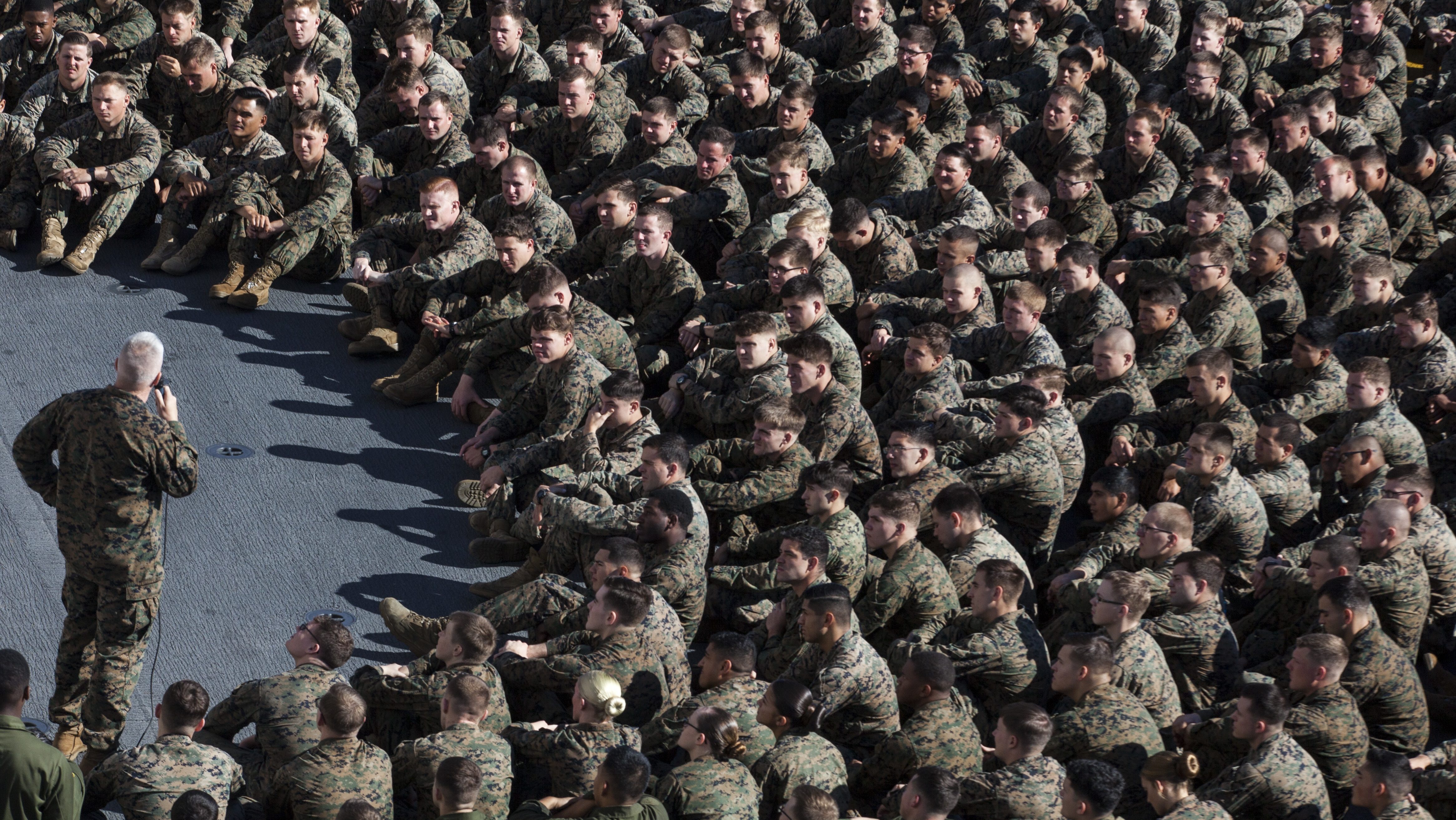 Sgt. Maj. Jim Lanham, sergeant major of the 31st Marine Expeditionary Unit, speaks to Marines during an all-hands formation aboard the USS Bonhomme Richard (LHD 6) while underway in the Pacific Ocean, July 26, 2017. Lanham and Col. Tye R. Wallace, commanding officer of the 31st MEU, encouraged the Marines and Sailors of the 31st MEU to continue to act as ambassadors of the Marine Corps. The 31st MEU partners with the Navy’s Amphibious Squadron 11 to form the amphibious component of the Bonhomme Richard Expeditionary Strike Group. The 31st MEU and PHIBRON 11 combine to provide a cohesive blue-green team capable of accomplishing a variety of missions across the Indo-Asia-Pacific region. (U.S. Marine Corps photo by Lance Cpl. Stormy Mendez/Released)