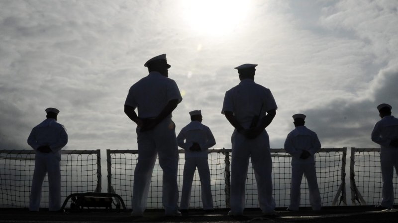 The San Diego sun begins to break through the clouds as sailors man the rails aboard the Military Sealift Command hospital ship USNS Mercy (T-AH 19) as it departs its homeport of San Diego to support Pacific Partnership 2012 (PP12). PP12 is the seventh in a series of U.S. Pacific Fleet-sponsored humanitarian and civic assistance missions that works with and through host and partner nations, and non-governmental organizations to strengthen regional relationships and capacity to collectively respond to natural disasters in Southeast Asia and the western Pacific region.