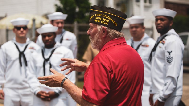 The Veterans of Foreign Wars Post 9587 commander speaks to U.S. Marines and Sailors at a luncheon during Fleet Week New York on May 27, 2022. As a part of Fleet Week New York 22, the Marine-Air Ground Task Force Fleet Week New York engages in special events throughout New York City and the Tri-State area showcasing sea service technologies, future innovation and connecting with citizens. Fleet Week New York brings more than 2,000 service members from the Marine Corps, Navy and Coast Guard offering live band performances, military vehicle and equipment displays, and other community relations projects. (U.S. Marine Corps photo by Sgt. Isaiah Campbell)