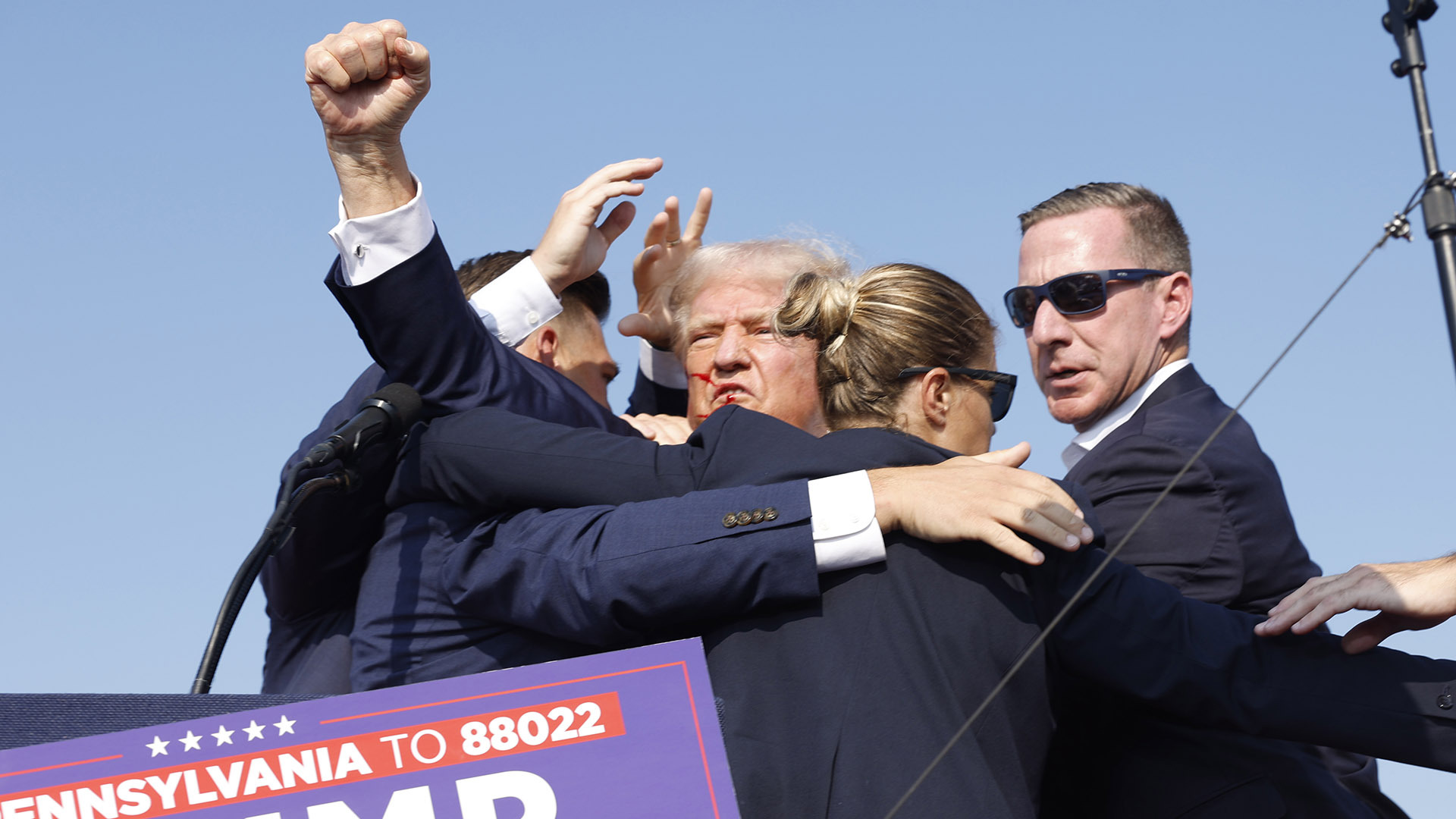 BUTLER, PENNSYLVANIA - JULY 13: Republican presidential candidate former President Donald Trump is rushed offstage during a rally on July 13, 2024 in Butler, Pennsylvania. (Photo by Anna Moneymaker/Getty Images)