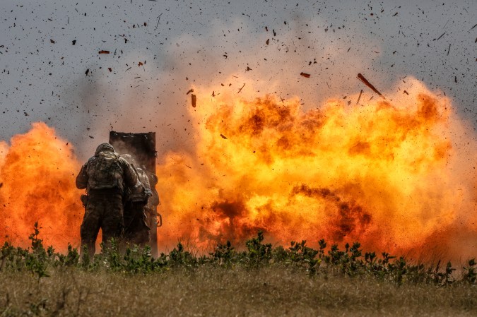 Combat engineers from the 2nd Armored Brigade Combat Team, 1st Cavalry Division blast through a concrete wall during demolition training at Curry Demo July 17.