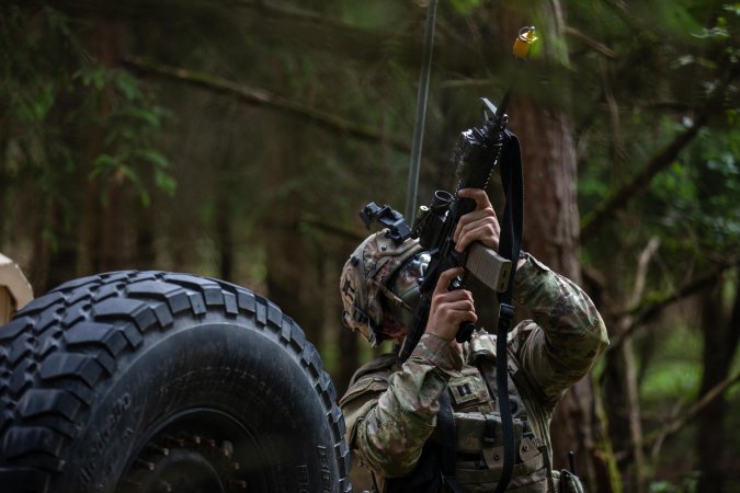 U.S. Soldiers assigned to the 3rd Battalion, 320nd Field Artillery Battery, 3rd Brigade Combat Team, 101st Airborne Division, react to a drone swarm attack during Exercise Combined Resolve 24-2 at the Joint Multinational Readiness Center near Hohenfels, Germany, May 29, 2024. Combined Resolve 24-2 is a key U.S. Army multi-domain interoperability exercise in Europe and a major investment in the cohesion of the NATO alliance and the overall readiness of allies and partners to work together in a dynamic security environment. (U.S. Army National Guard photo by Sgt. 1st Class Brandon Nelson)