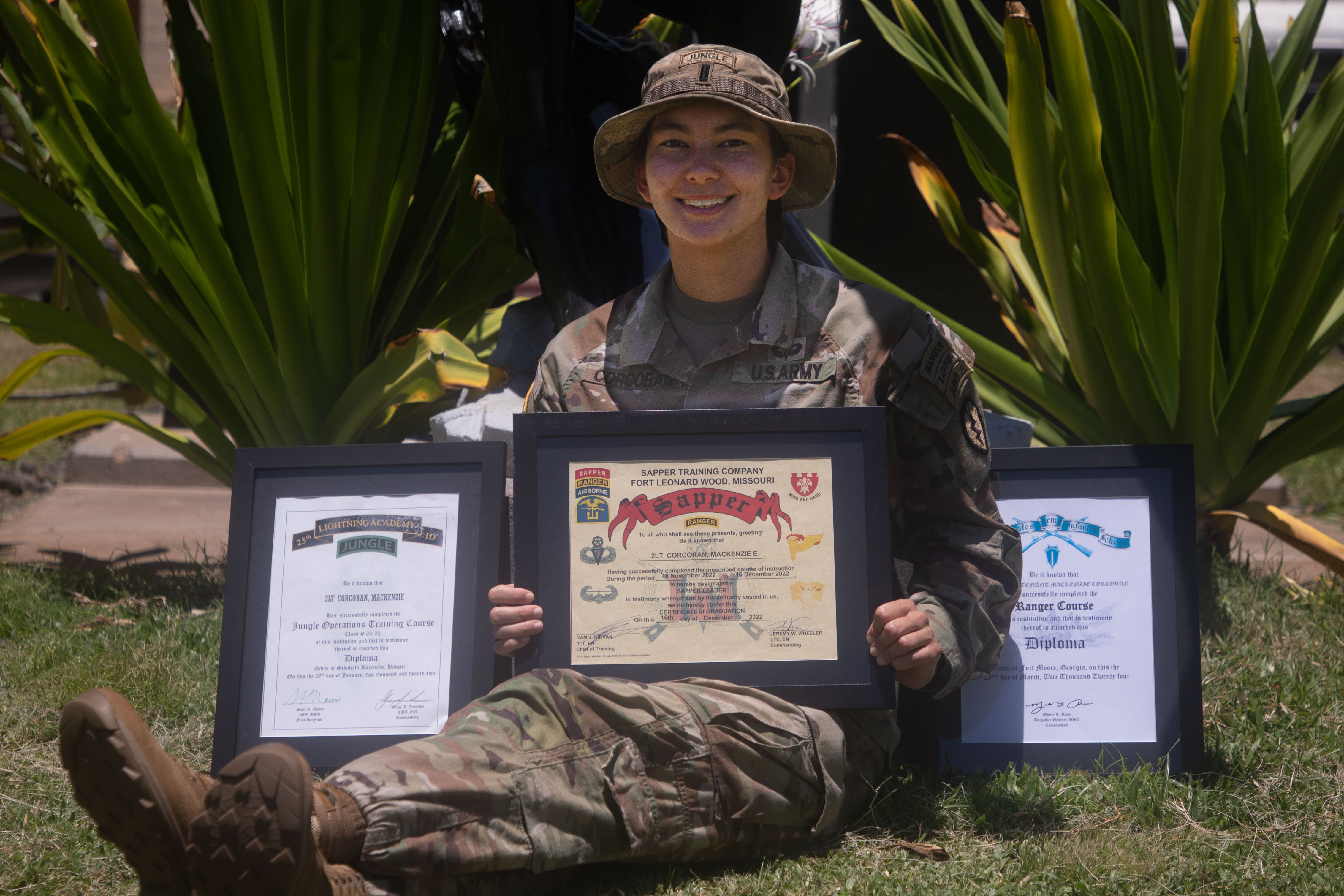 1st Lt. Mackenzie Corcoran, assigned to the 29th Brigade Engineer Battalion, 25th Infantry Division, poses with her Jungle, Sapper and Ranger certificates at Schofield Barracks, Hawaii, June 6, 2024. Corcoran earned the Ranger, Sapper, and Jungle tabs by completing the respective challenging Army courses. (U.S. Army photo by Sgt. Johanna Pullum)