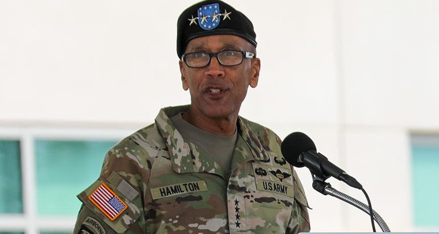 Suspended Army general denies he pushed an officer's promotion