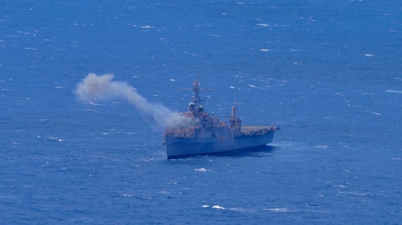 The USS Dubuque smokes after taking a missile hit during a SINKEX on July 11, 2024. (photo by Sgt. Perla Alfaro/U.S. Army)
