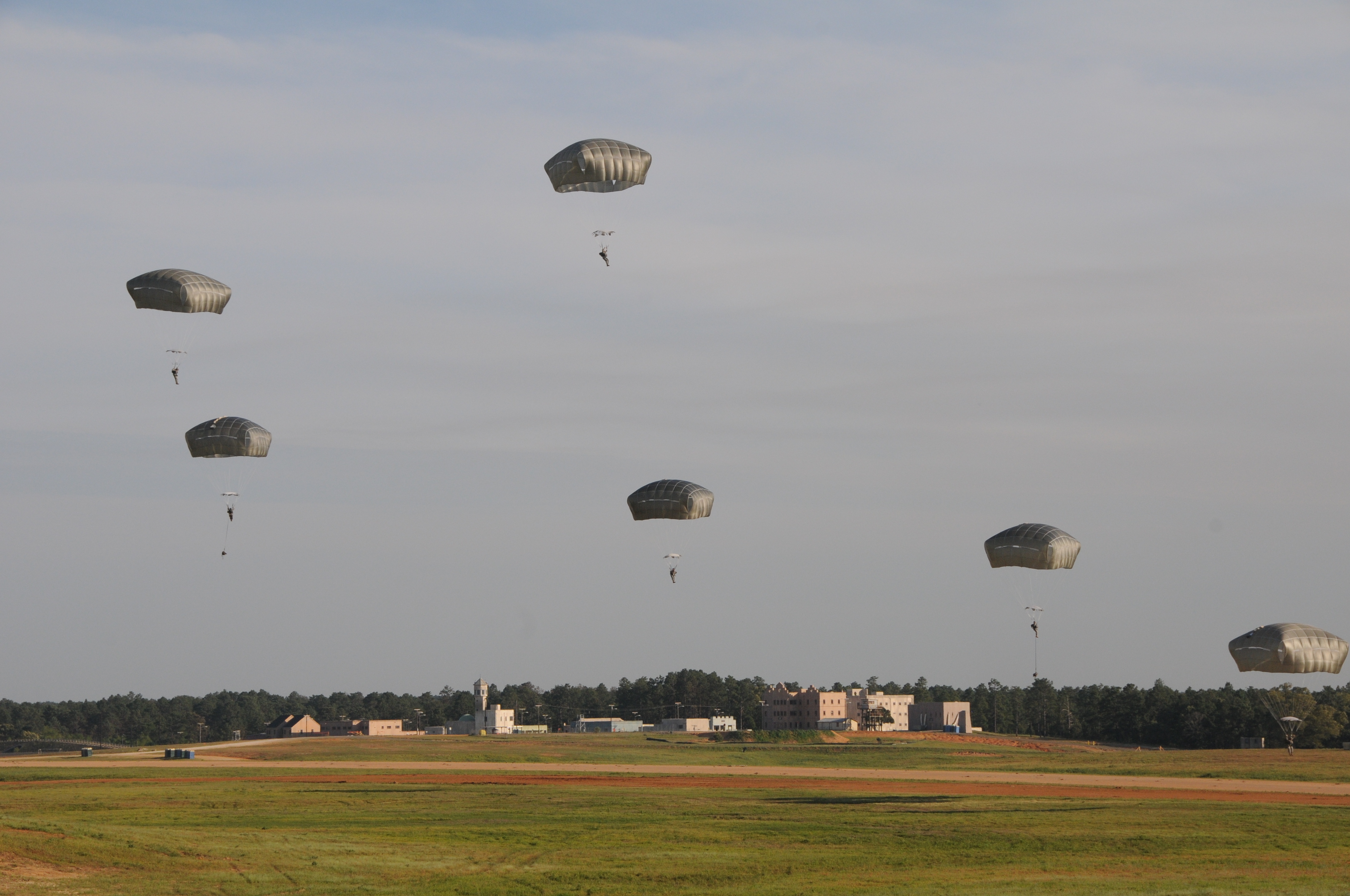 Paratroopers landing on Geronimo drop zone during an airborne operation at Fort Johnson, La., April 30.