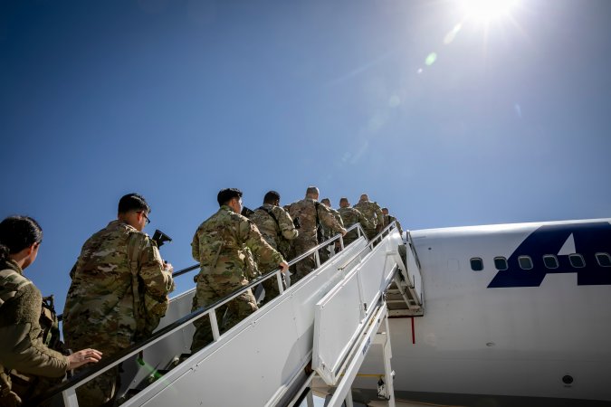 U.S. Army Soldiers assigned to the 34th Infantry Division “Red Bulls” load a plane at Robert Gray Army Airfield, Fort Cavazos, Texas, March 10, 2024, in preparation for the unit’s movement overseas. Red Bull Soldiers will spend nearly 10 months away from their homes in support of Operation Spartan Shield as part of a regularly planned operation. (U.S. Army photo by Staff Sgt. Mahsima Alkamooneh)