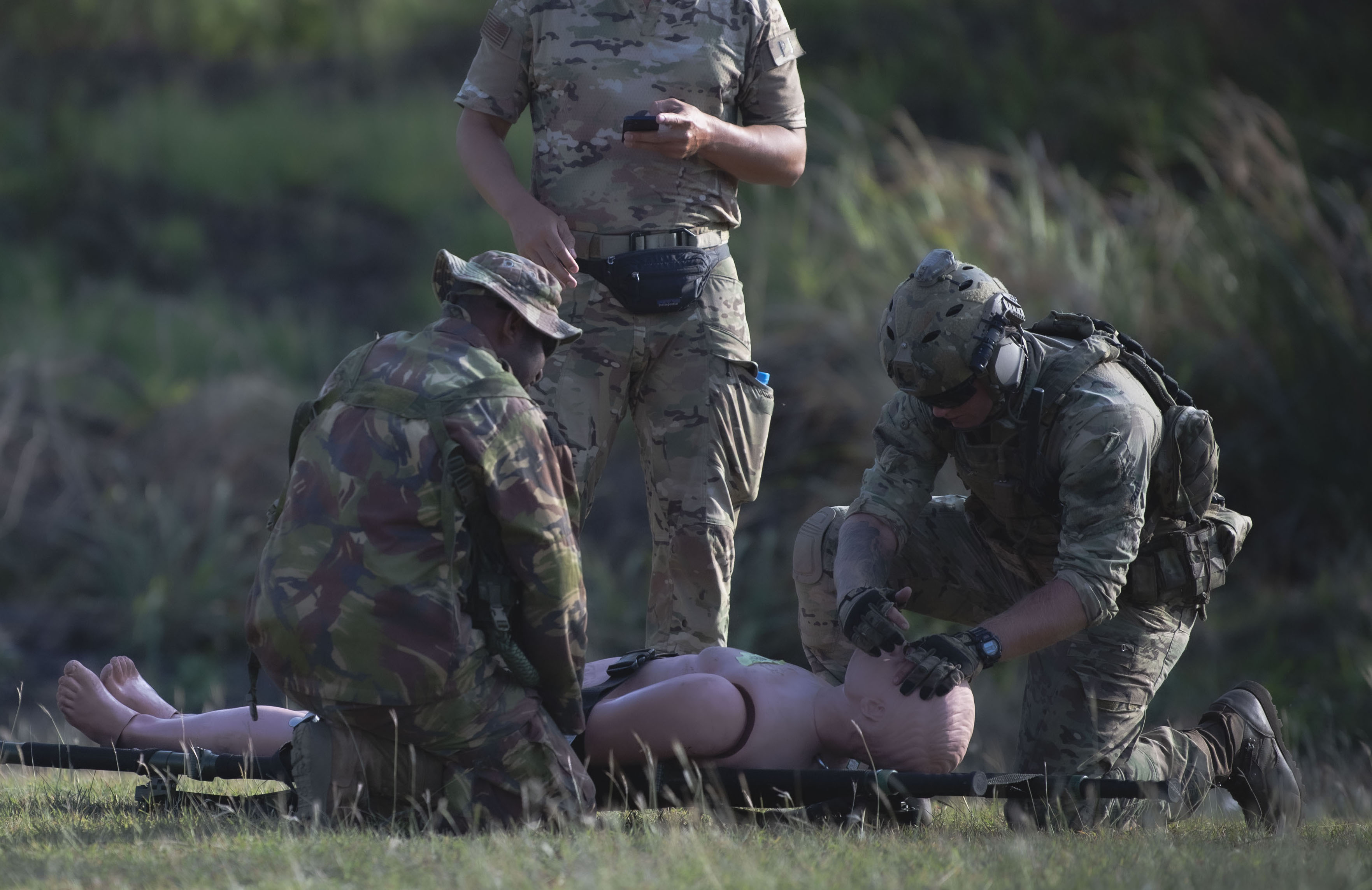 Members of the U.S. Air Force and Papua New Guinea Defence Force participate in a mass casualty training exercise during Pacific Angel 24-1 at Port Moresby, Papua New Guinea, Aug. 29, 2024. The mass casualty exercise was the culminating event of three days training and subject matter expert exchanges between U.S. Air Force, Royal Australian Air Force and PNGDF survival and rescue personnel. U.S. Indo-Pacific Command sponsors Pacific Angel to promote interoperability and demonstrate Department of Defense support capabilities for HA/DR events by conducting global medical outreach and enhancing regional partnerships. (U.S. Air Force photo by Senior Master Sgt. DeAndre Curtiss)