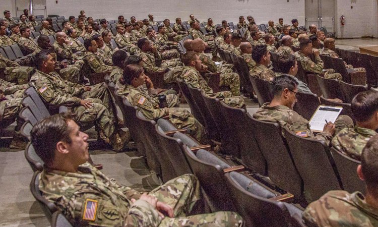 U.S. Army Command Sgt. Maj. Alexander Aguilastratt, Command Sgt. Maj. Of Charlie Squadron, Asymmetric Warfare Group (AWG), speaks to Soldiers during the AWG Recruitment Brief at Fort Bragg, Nc., May 16, 2018. The objective of the recruiting brief was to inform Soldiers from the 82nd Airborne Division and surrounding units at Fort Bragg to the mission opportunities available at AWG as an Operational Advisor or as an Operational Support member.