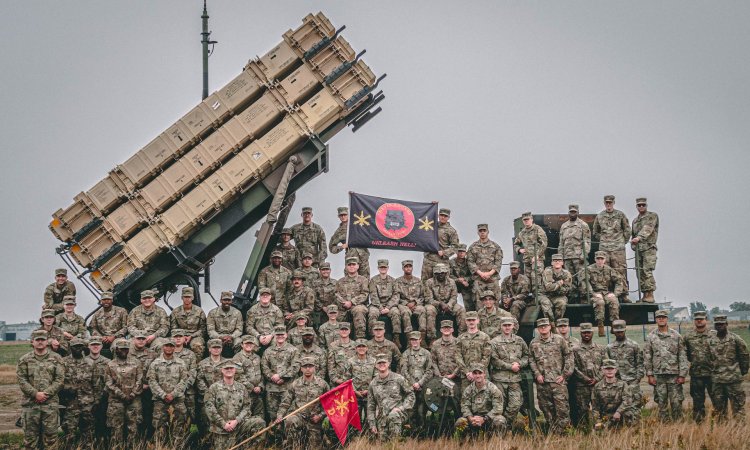 U.S. Army air defenders assigned to 5th Battalion, 7th Air Defense Artillery Delta Battery pose on a 10th Army Air Missile Defense Command Patriot launching station Aug. 15 in Poland with the outgoing commander Capt. Robert Knabel. Alongside our allies and partners, 10th AAMDC systems demonstrate the readiness, capacity and resolve to deter and, if necessary, defeat aggression. (U.S. Army photo by Sgt. 1st Class Christopher Smith)