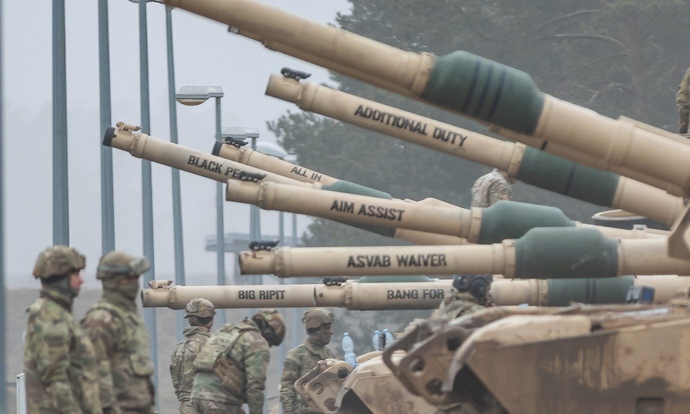 U.S Soldiers assigned to 1st Battalion, 9th Cavalry Regiment, 2nd Armored Brigade Combat Team, 1st Cavalry Division, line up their M1A2 Abrams tank in the firing range staging area in Bemowo Piskie, Poland, Feb. 16, 2023. The 4 ID and their supporting units are proudly working alongside NATO allies and regional security partners to provide combat-credible forces to V Corps, America’s forward deployed corps in Europe. (U.S. Army National Guard photo by Sgt. John Schoebel)