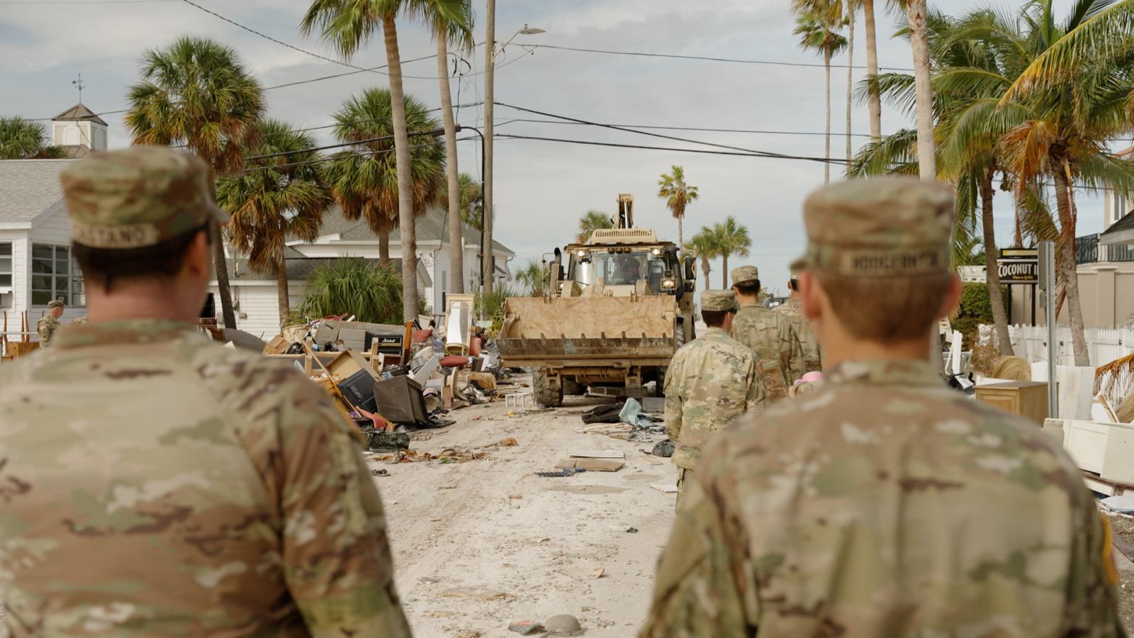 Soldiers from A Co., 53rd BEB, clear streets of debris from Hurricane Helene in St. Pete Beach to prepare for Hurricane Milton, Oct. 8, 2024. The Florida National Guard clears debris and prepares critical infrastructure ahead of Hurricane Milton’s landfall. (U.S. Army photo by 1st Lt. Brandon Miles)