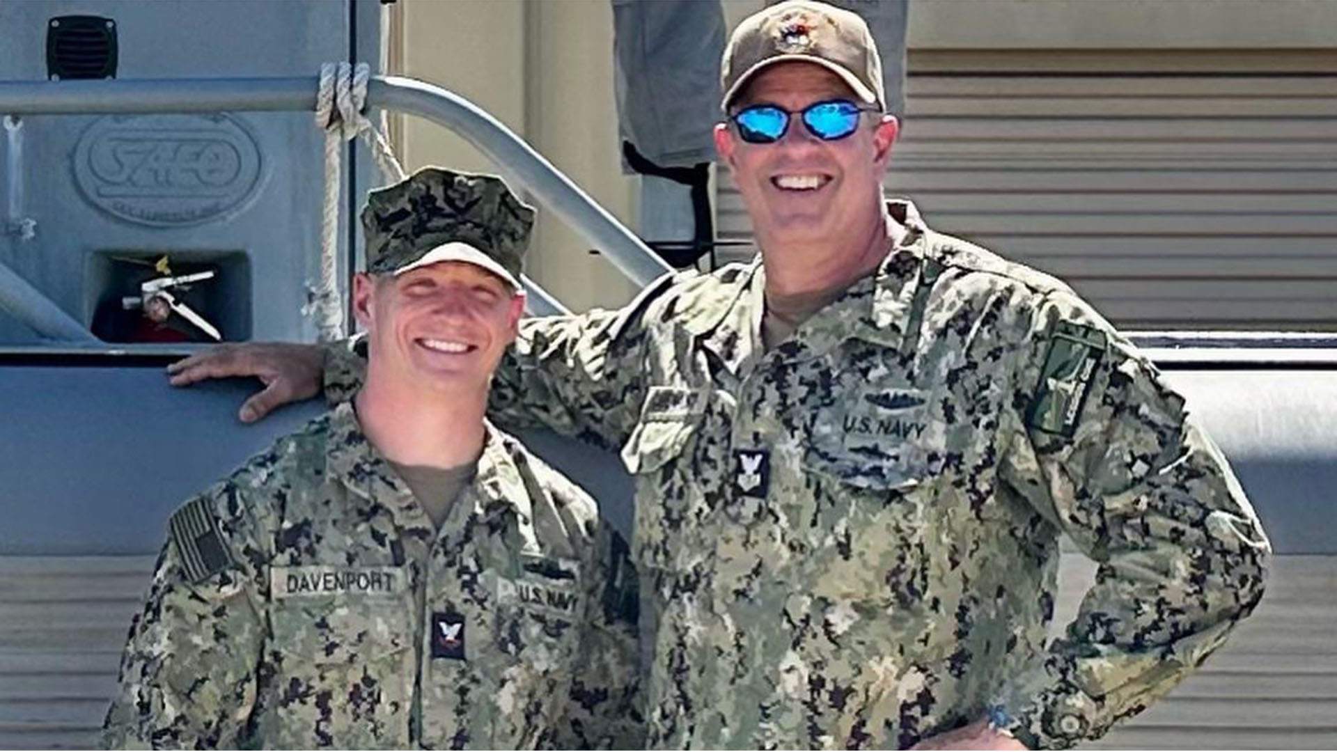 Courtesy photo of then Petty Officer Third Class Clayton Davenport (left) with his father Petty Officer First Class Brett Davenport.