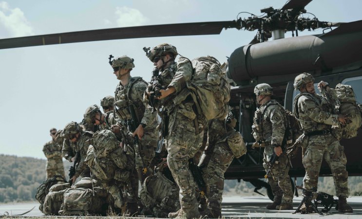 U.S. Army paratroopers assigned to the 173rd Airborne Brigade conduct cold load training on UH-60 Blackhawk and CH-47 Chinook helicopters as part of exercise Saber Junction 24 in Hohenfels, Germany, Aug. 29, 2024. Saber Junction 24 is a multinational rotational exercise designed to assess the readiness of the U.S. Army's 173rd Airborne Brigade to execute unified land operations in a joint, combined environment and to promote interoperability with more than 4,500 participants from the U.S. and Allied and partner nations at Hohenfels training area. The 173rd Airborne Brigade is the U.S. Army's Contingency Response Force in Europe, providing rapidly deployable forces to the United States European, African, and Central Command areas of responsibility. Forward deployed across Italy and Germany, the brigade routinely trains alongside NATO allies and partners to build partnerships and strengthen the alliance. (U.S. Army photo by Sgt. Joskanny J. Lua)