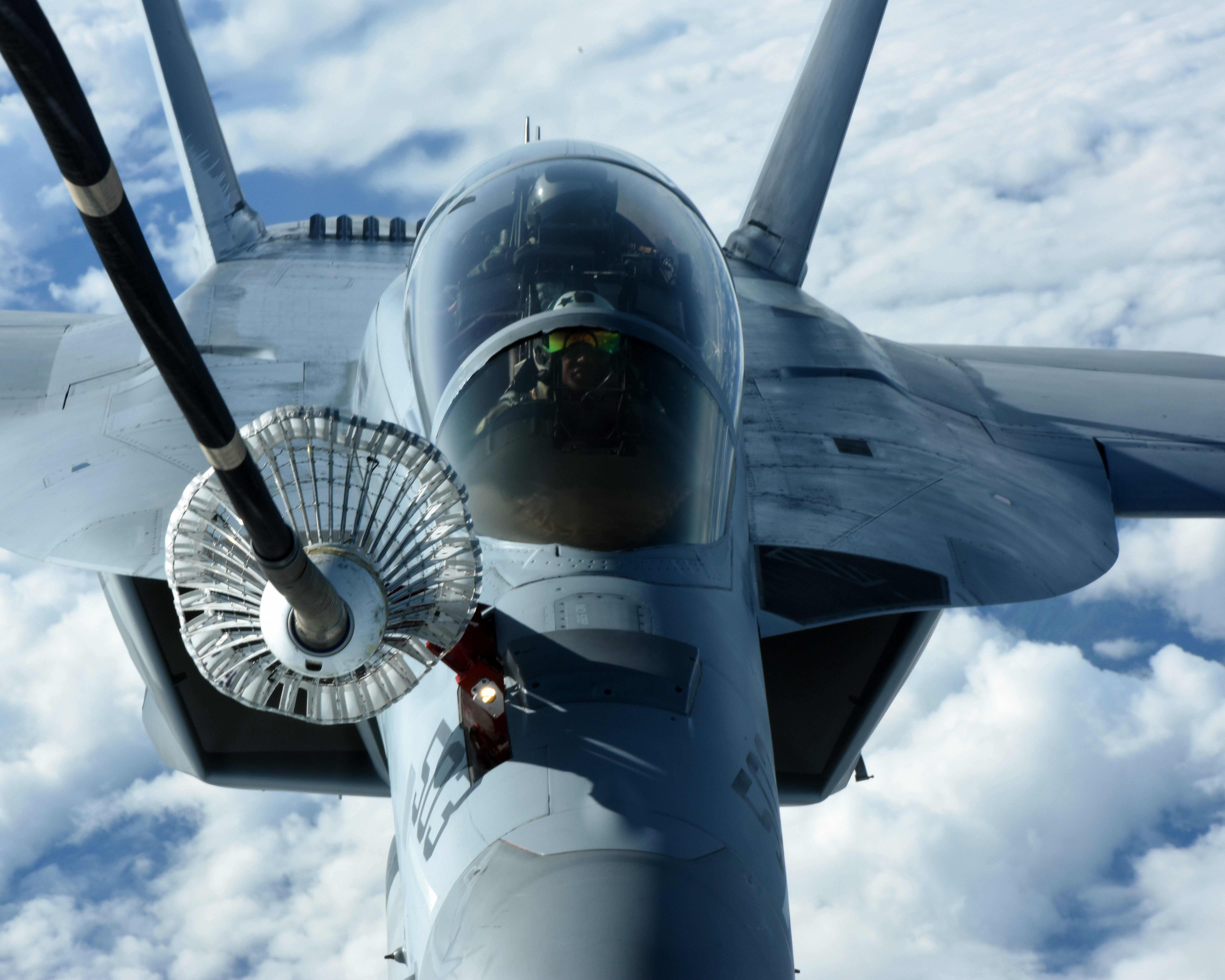 A Navy EA-18 Growler connects to a KC-10 extender September 19, 2019. 