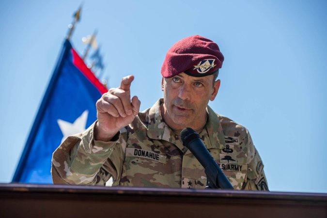 U.S. Army Lt. Gen. Christopher Donahue, Commanding General of XVIII Airborne Corps and Fort Liberty, shares words with soldiers and family during the 3rd Expeditionary Sustainment Command (ESC) change of command ceremony, at Fort Liberty, N.C., on June 11, 2024. The ceremony was held to provide an opportunity for leaders and Soldiers to say farewell to the outgoing commanding general and welcome the incoming commanding general for the 3rd Expeditionary Sustainment Command. (U.S. Army photo by Spc. PS Bailey Whilden)