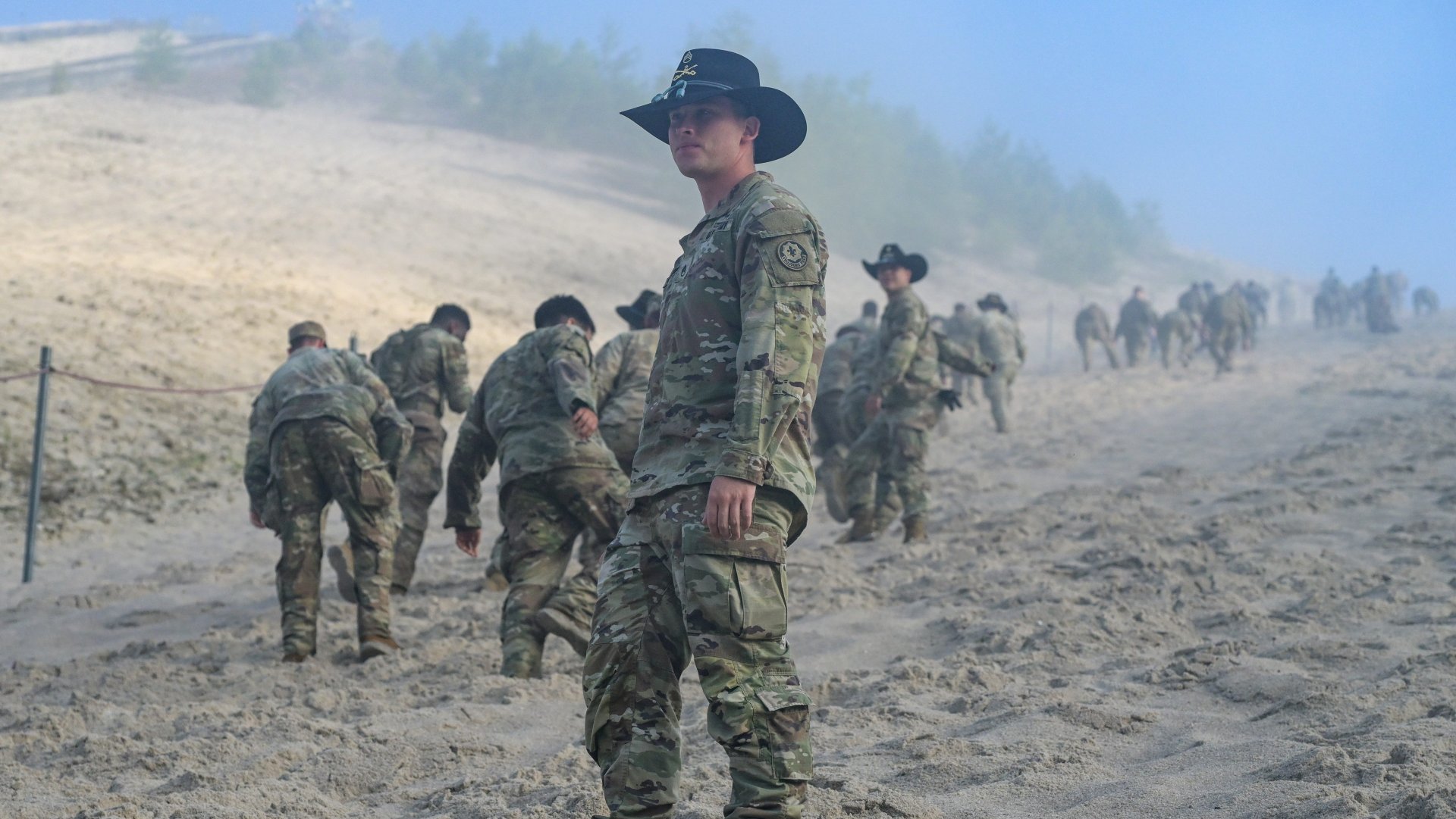 U.S. Soldiers assigned to 1st Squadron, 2nd Cavalry Regiment hike up Monte Kaolino during the unit spur ride in Hirschau, Germany, Aug. 1, 2024. During the event, Troopers must complete a series of warrior tasks and drills in order to obtain the right to wear the cavalry's coveted spurs. (U.S. Army photo by Markus Rauchenberger)