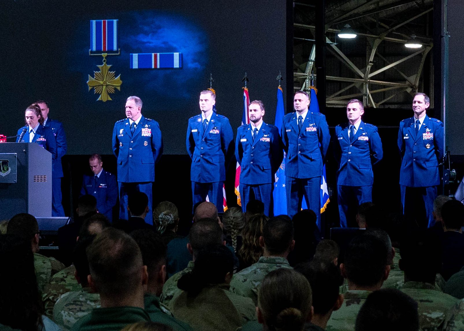 U.S. Air Force Gen. James Hecker, U.S. Air Forces in Europe - Air Forces Africa commander, prepares to present the Distinguished Flying Cross to members of the 494th Fighter Squadron, during a ceremony at RAF Lakenheath, England, Nov. 12, 2024. Airmen from the 494th Fighter Squadron and 494th Fighter Generation Squadron were recognized for their contributions during a defensive operation against hundreds of one-way attack drones and missiles launched from Iran and Houthi-controlled areas of Yemen against Israel April 13-14, 2024, while deployed in the U.S. Central Command's area of responsibility. (U.S. Air Force photo by Senior Airman Olivia Gibson)