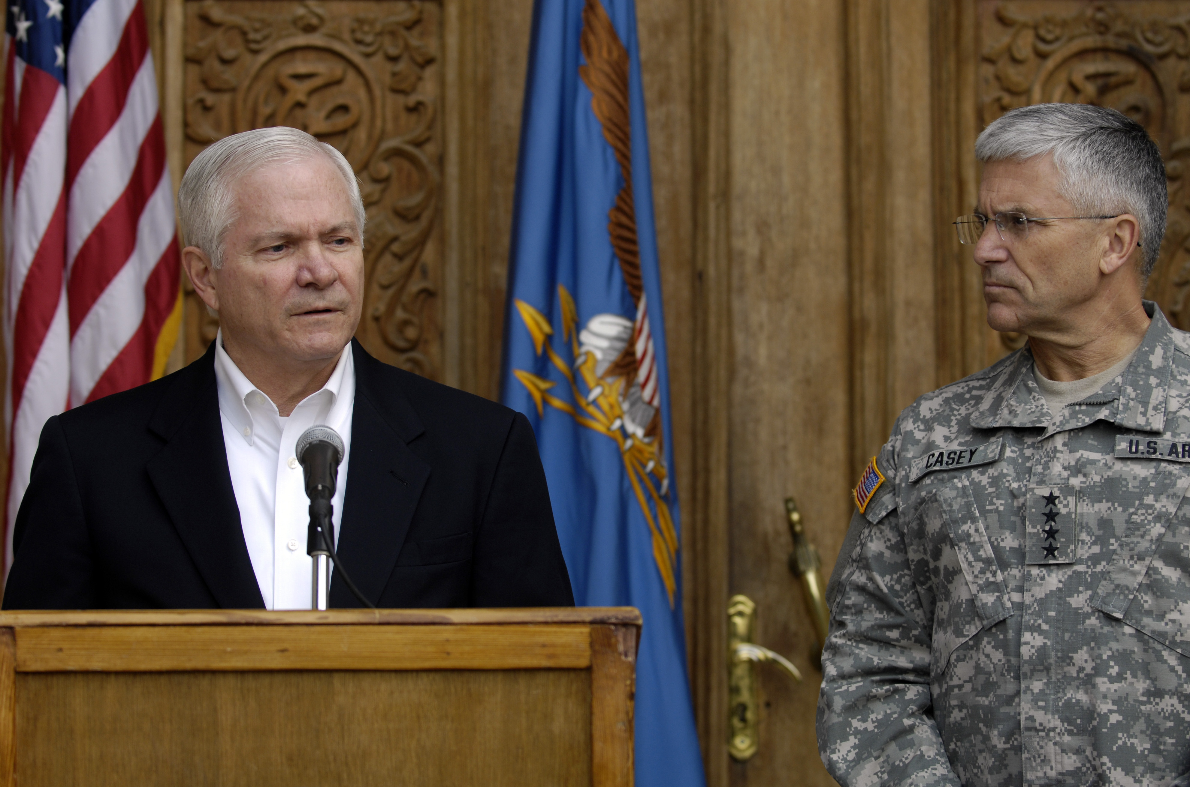 Defense Secretary Robert Gates responds to a question as Gen. George Casey, commander multi-national forces-Iraq looks on, during a press conference in Baghdad, Iraq, Dec. 22, 2006. Gates visited Iraq to meet with troops, top miltitary leaders, and Iraqi government officials to help him assess the current situation in order to make a recommendation to the president regarding the future of Iraq. Defense Dept. photo by Cherie A. Thurlby (released)