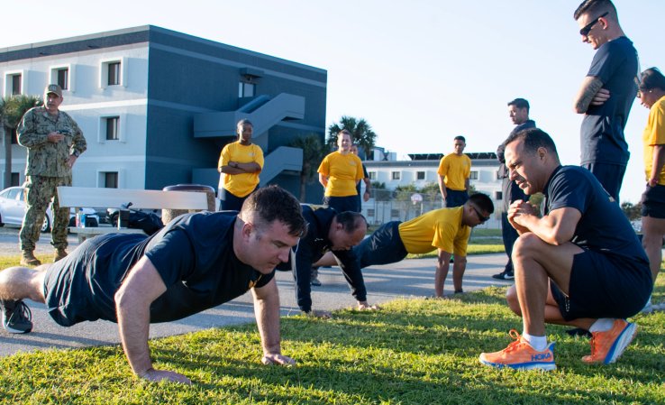 MAYPORT, Fla. (Apr. 14, 2024) – Master Chief Electronics Technician Ryan Magill (left), a native of Valparaiso, Ind., conducts push-ups during U.S. Naval Forces Southern Command/U.S. 4th Fleet’s Navy Reserves physical readiness test, Apr. 14. COMUSNAVSO/4th Fleet supports U.S. Southern Command’s joint and combined military operations by employing maritime forces in cooperative maritime security operations to maintain access, enhance interoperability, and build enduring partnerships in order to enhance regional security and promote peace, stability and prosperity in the Caribbean, Central and South American region. (U.S. Navy photo by Mass Communication Specialist 2nd Class Jacob Sippel)