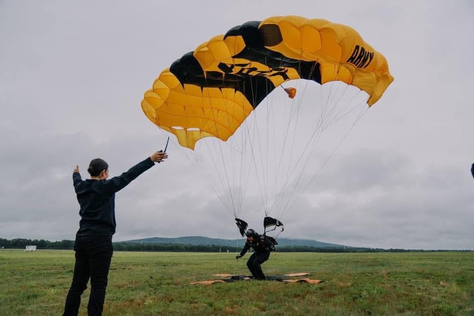 Spc. Maribeth Kossman working as a ground control officer for the Army's Golden Knights Parachute Team.