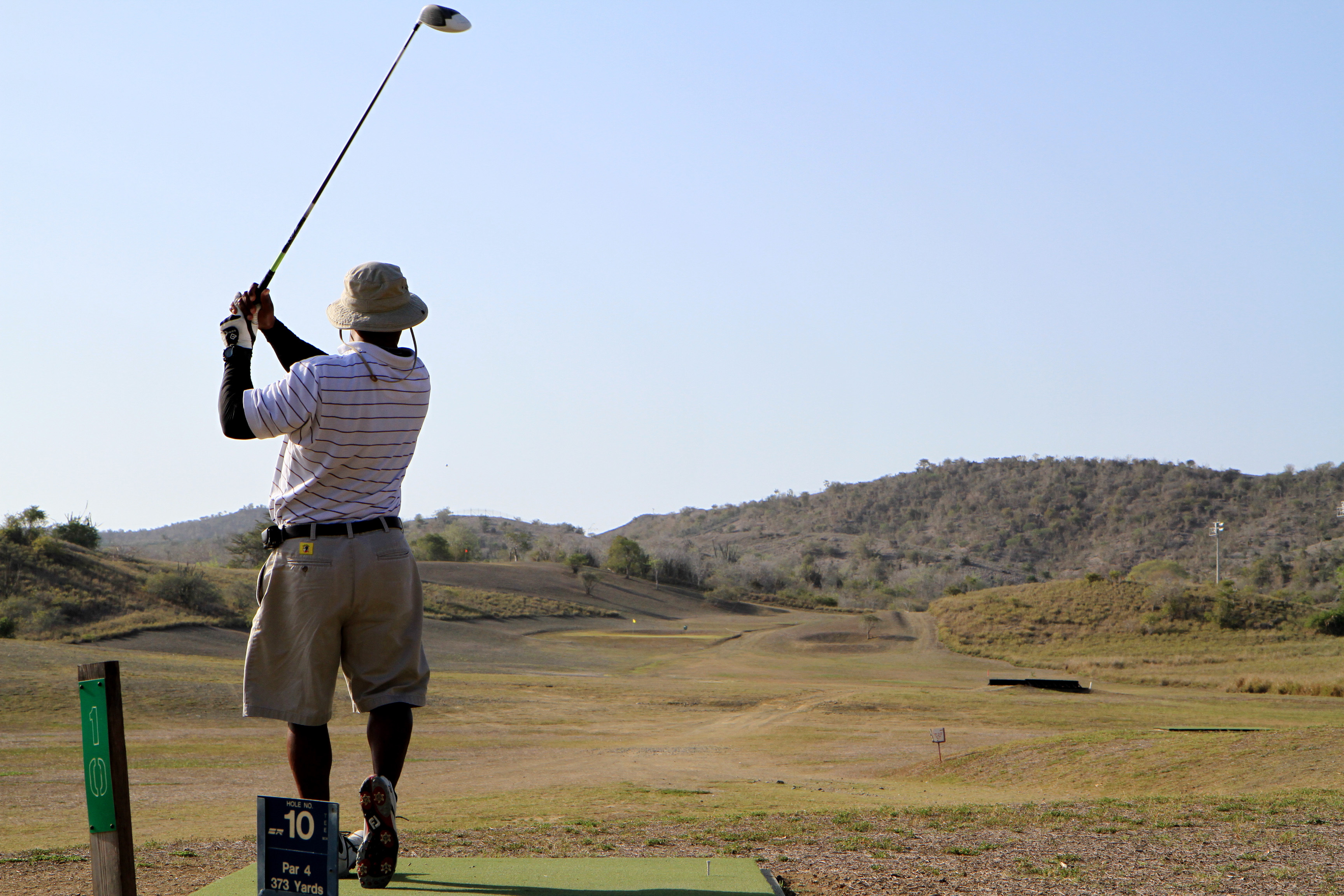 U.S. Navy Lieutenant Commander Dario Morgan, the Medical Service Corps department head for human resources at U.S. Navy Hospital Guantanamo Bay, tees off at the GTMO Golf Classic, May 4.