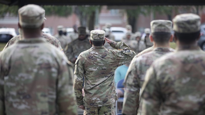 The noncommissioned officer commanding the formation salutes the 603rd Aviation Support Battalion command sergeant major during the battalion’s drill and ceremony competition during Marne First Friday at Hunter Army Airfield, Georgia, June 4. Marne First Friday allows units to conduct training and events that help build team work and esprit de corps across the formation. (U.S. Army photo by Sgt. Andrew McNeil/ 3rd Combat Aviation Brigade, 3rd Infantry Division)