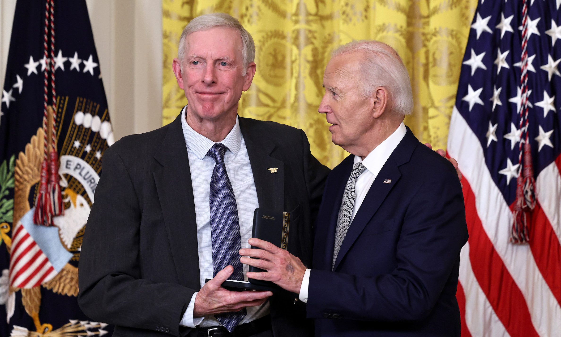 WASHINGTON, DC - JANUARY 02: U.S. President Joe Biden presents Frank Butler with the Presidential Citizens Medal during a ceremony in the East Room of the White House on January 02, 2025 in Washington, DC. Biden gave the medal to 20 people who worked on causes supported by the president during his decades of public service, including desegregation, women's rights, gun safety, LGBTQ+ rights, cancer research and military affairs. (Photo by Chip Somodevilla/Getty Images)